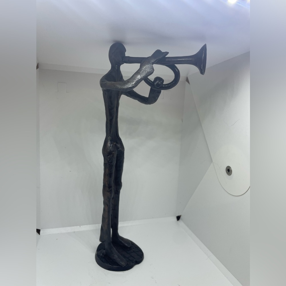 Cast Iron Horn Player